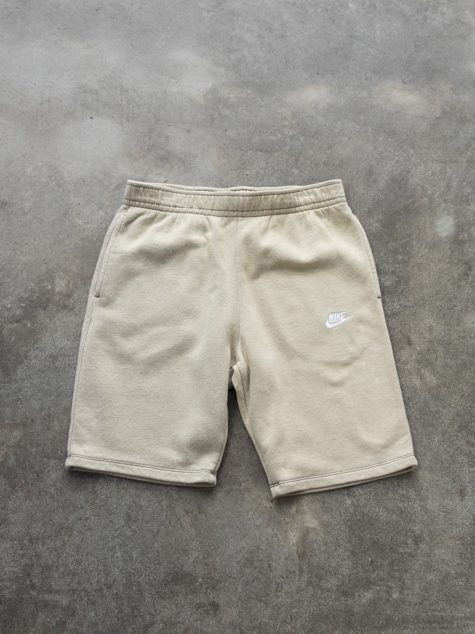 nike long sweat shorts