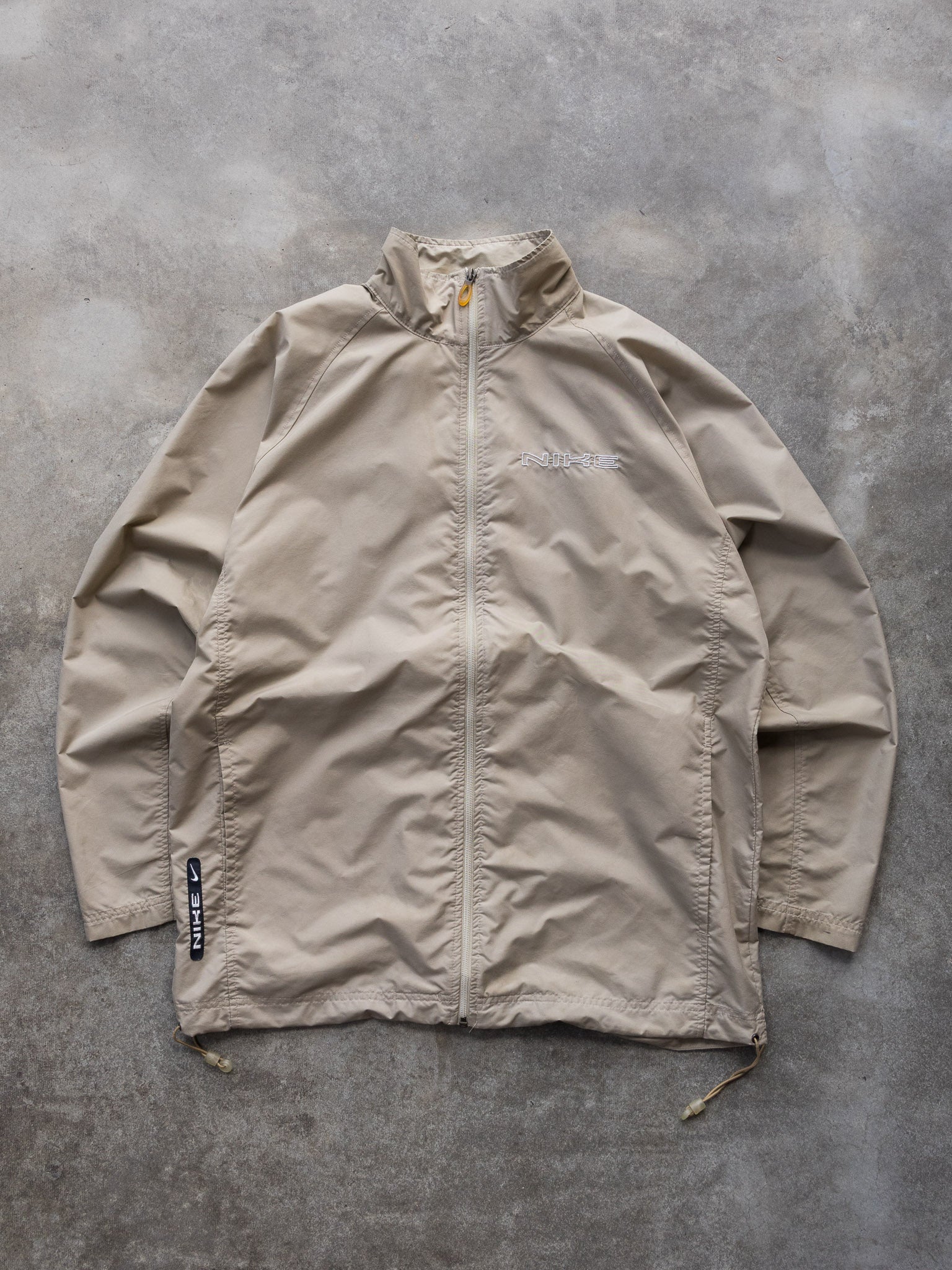 Vintage 00s Beige Nike Spell Out Windbreaker (L)