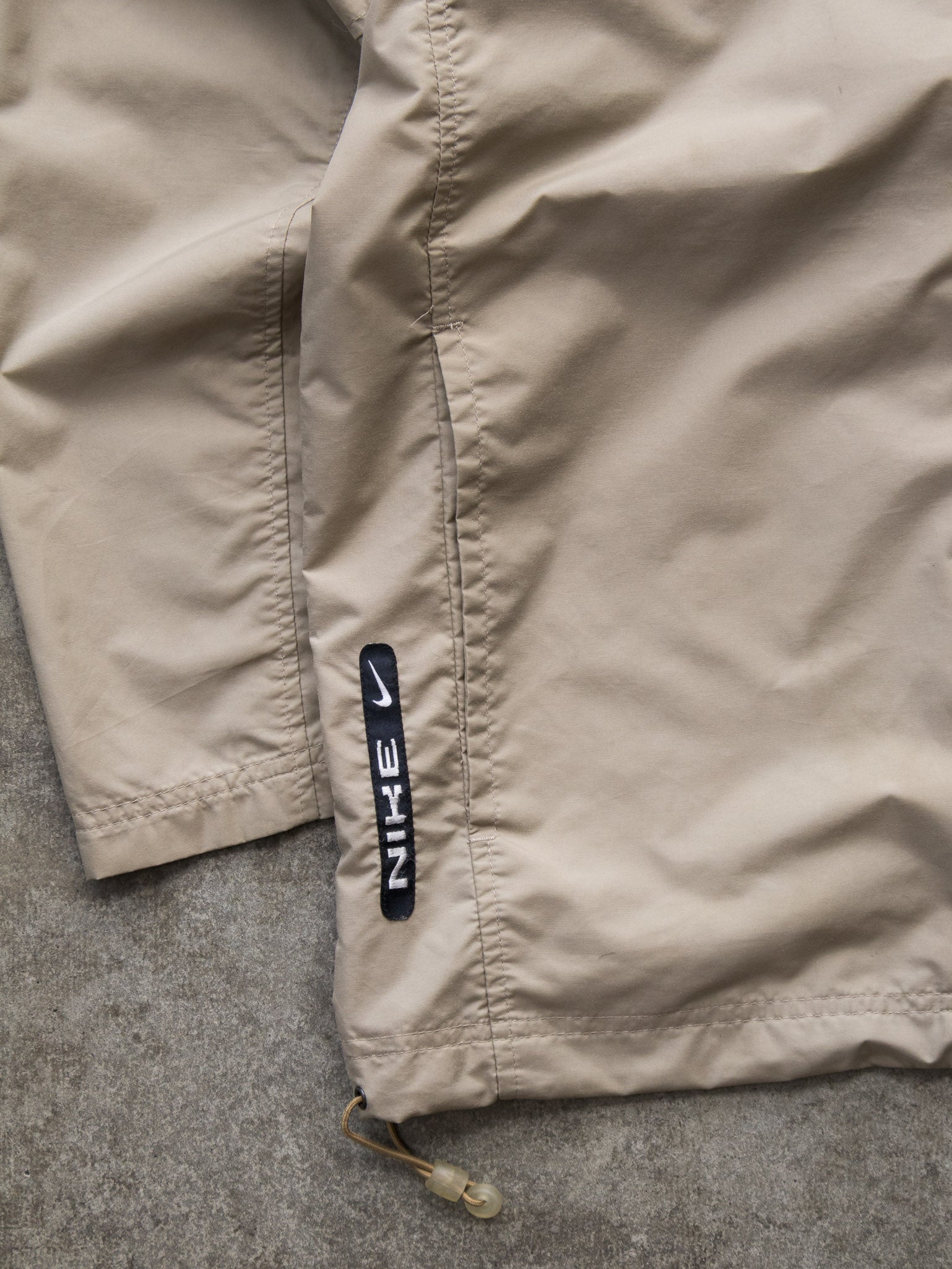 Vintage 00s Beige Nike Spell Out Windbreaker (L)