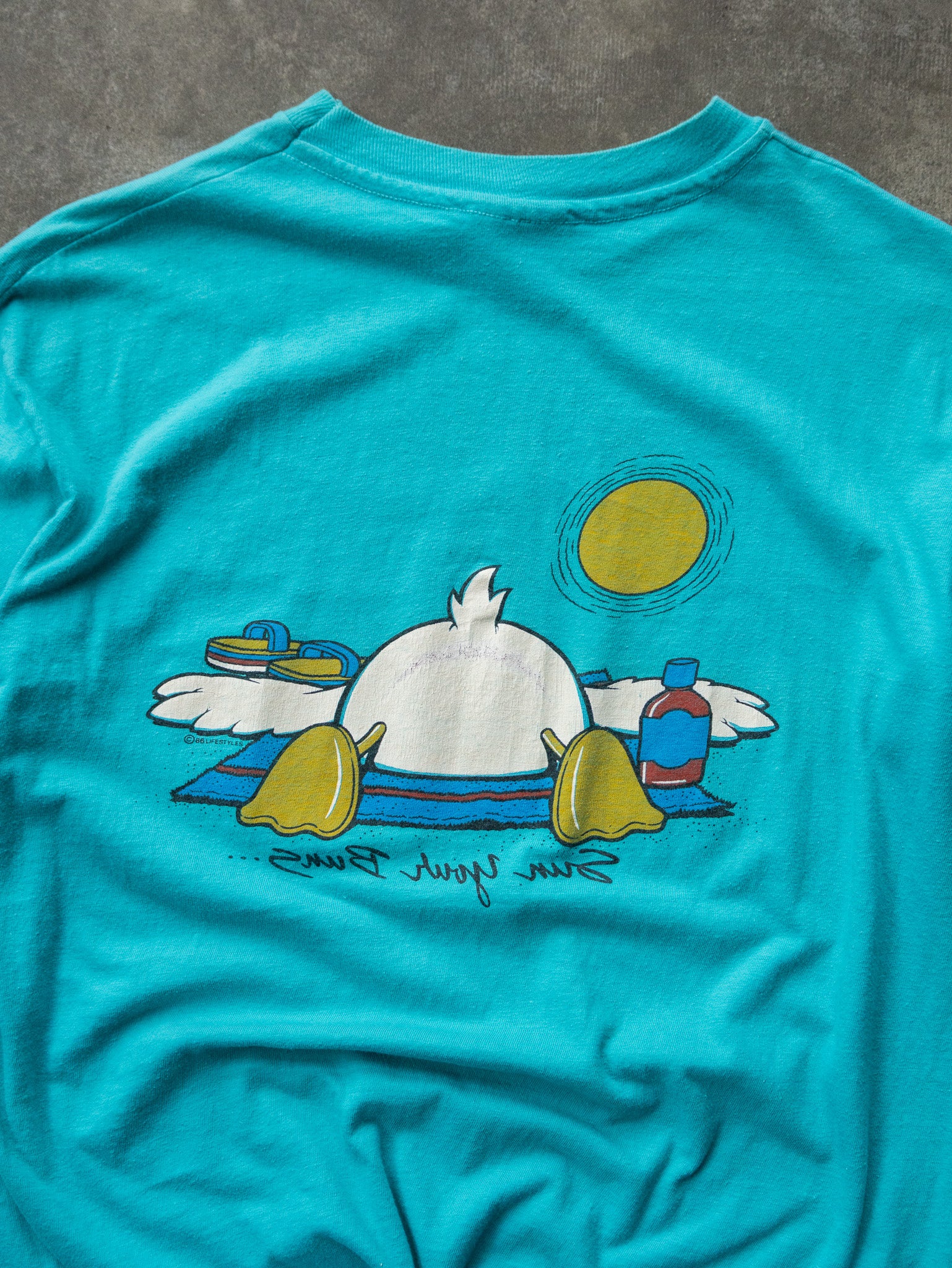 Vintage 1985 Turquoise Sun Your Buns Graphic Tee (M)