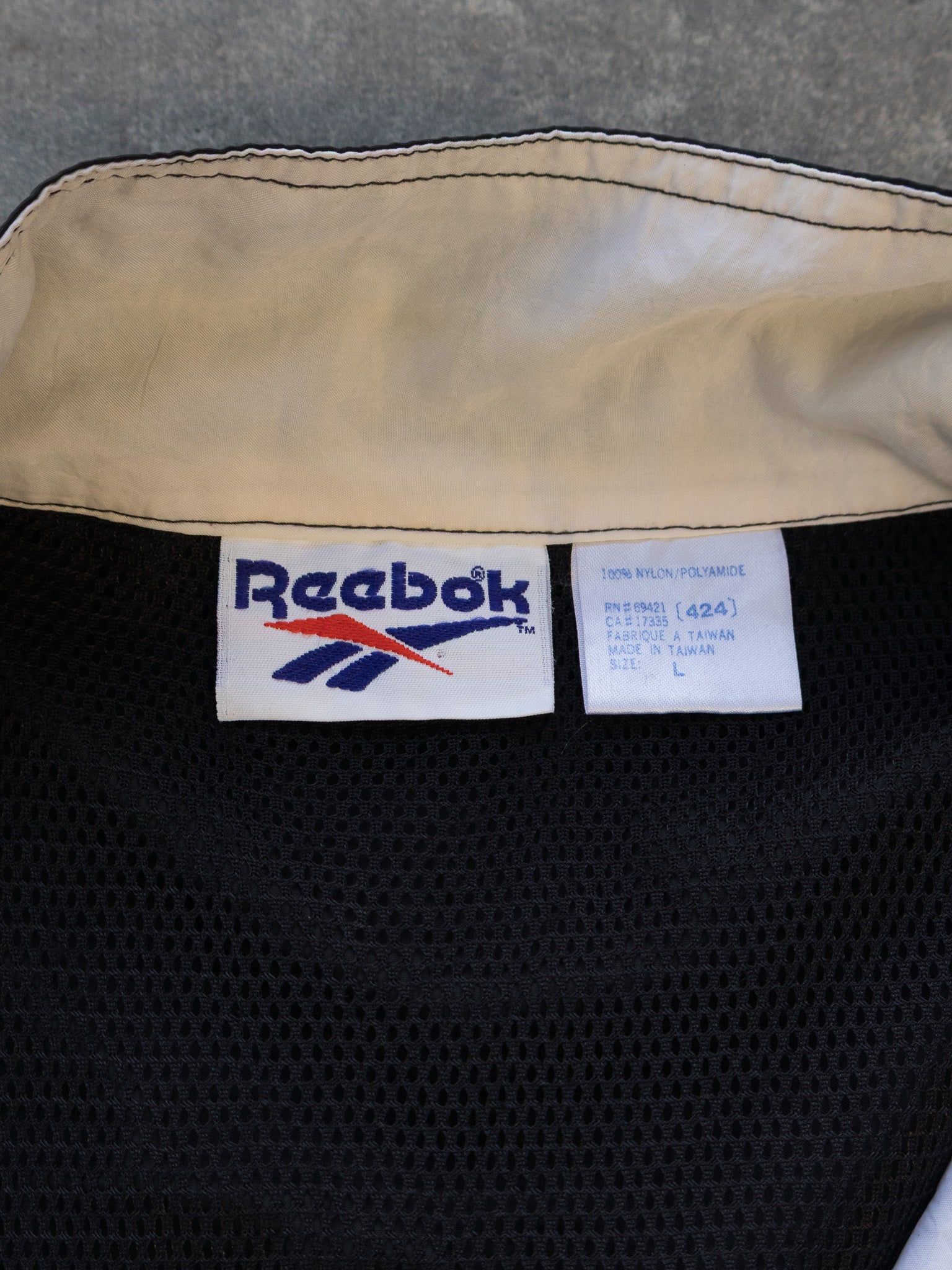 Vintage Black Reebok Pattern Sleeve Half Zip Jacket (L)
