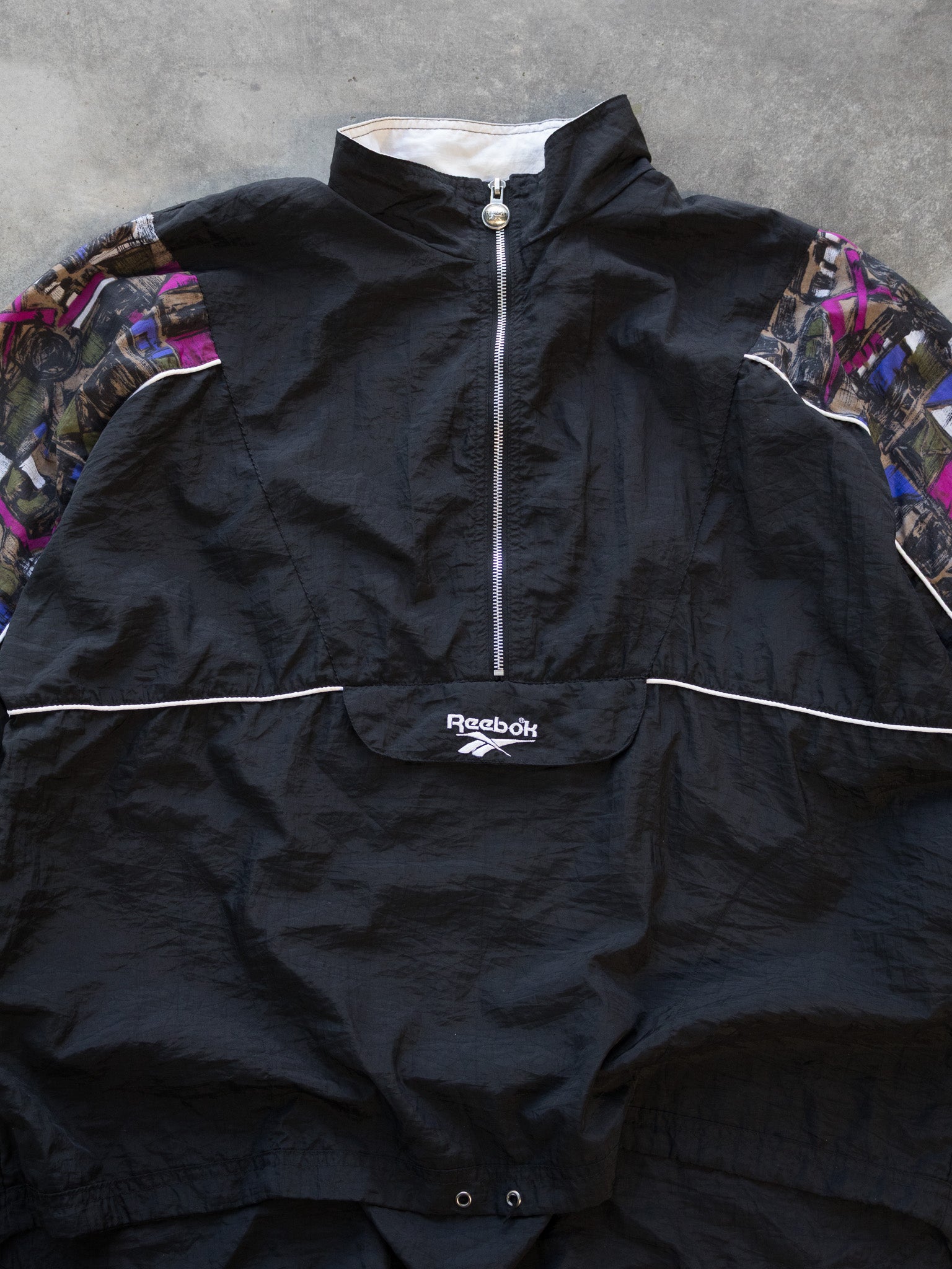 Vintage Black Reebok Pattern Sleeve Half Zip Jacket (L)