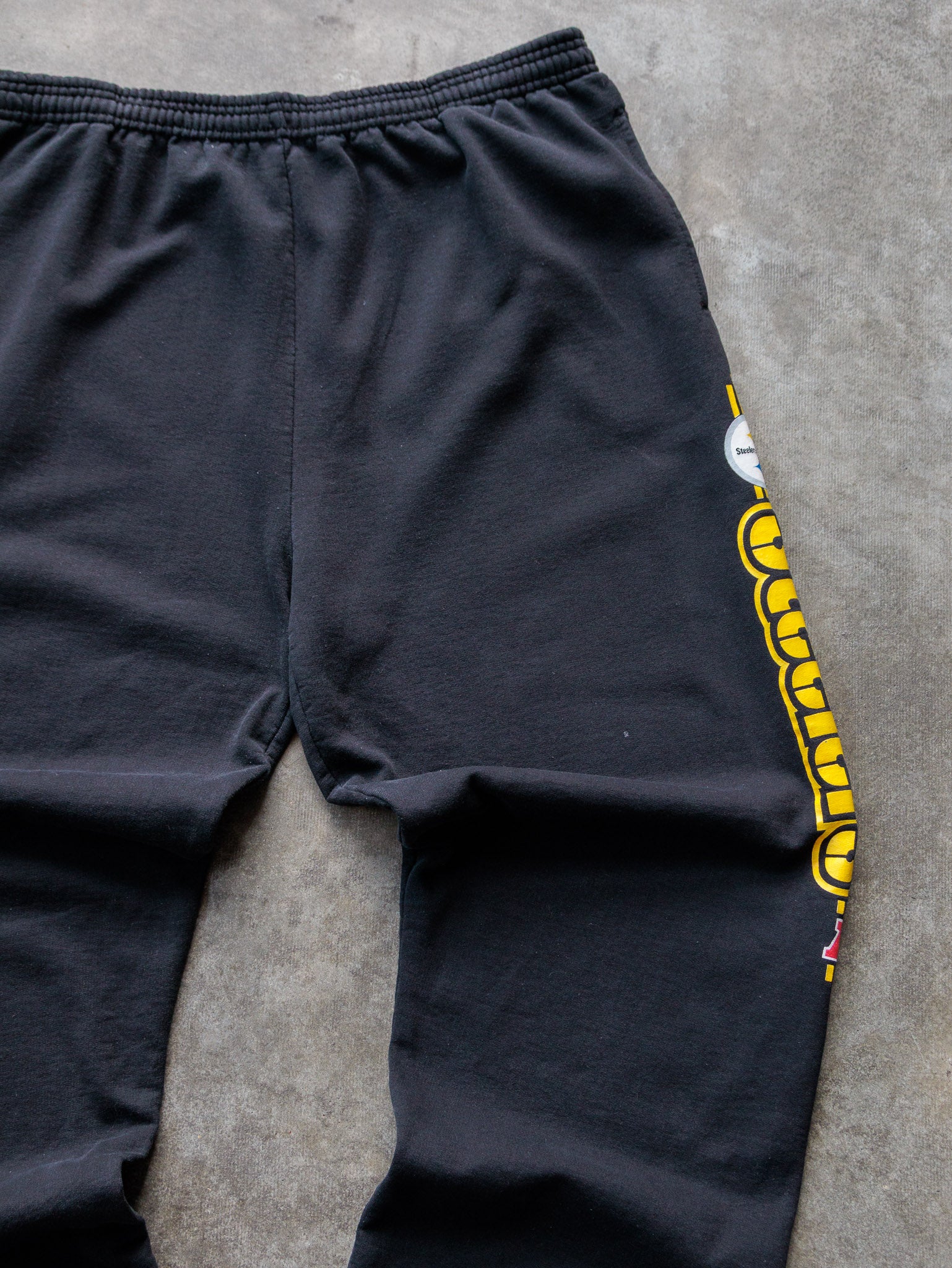 Vintage Black Pittsburgh Steelers Spell Out Sweatpants (XL)