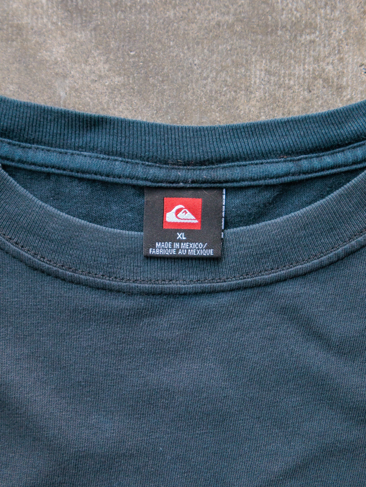Vintage 00s Thrashed Faded Navy Quiksilver Spell Out Tee (XL)