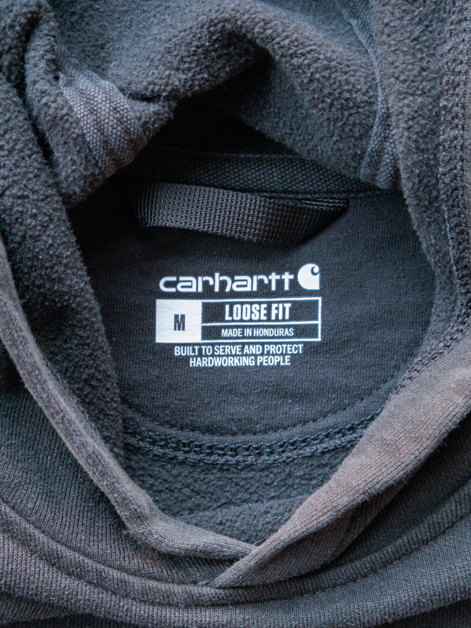 Vintage Faded Black Carhartt Hoodie (M)