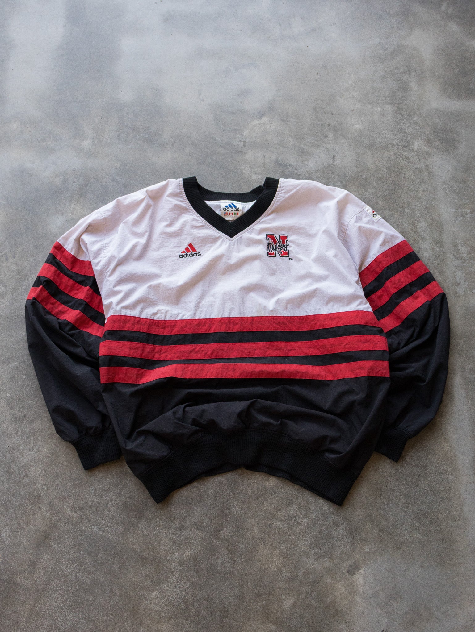 Vintage 90s White & Black Nebraska Huskers Adidas V-Neck Pullover Jacket (XL)