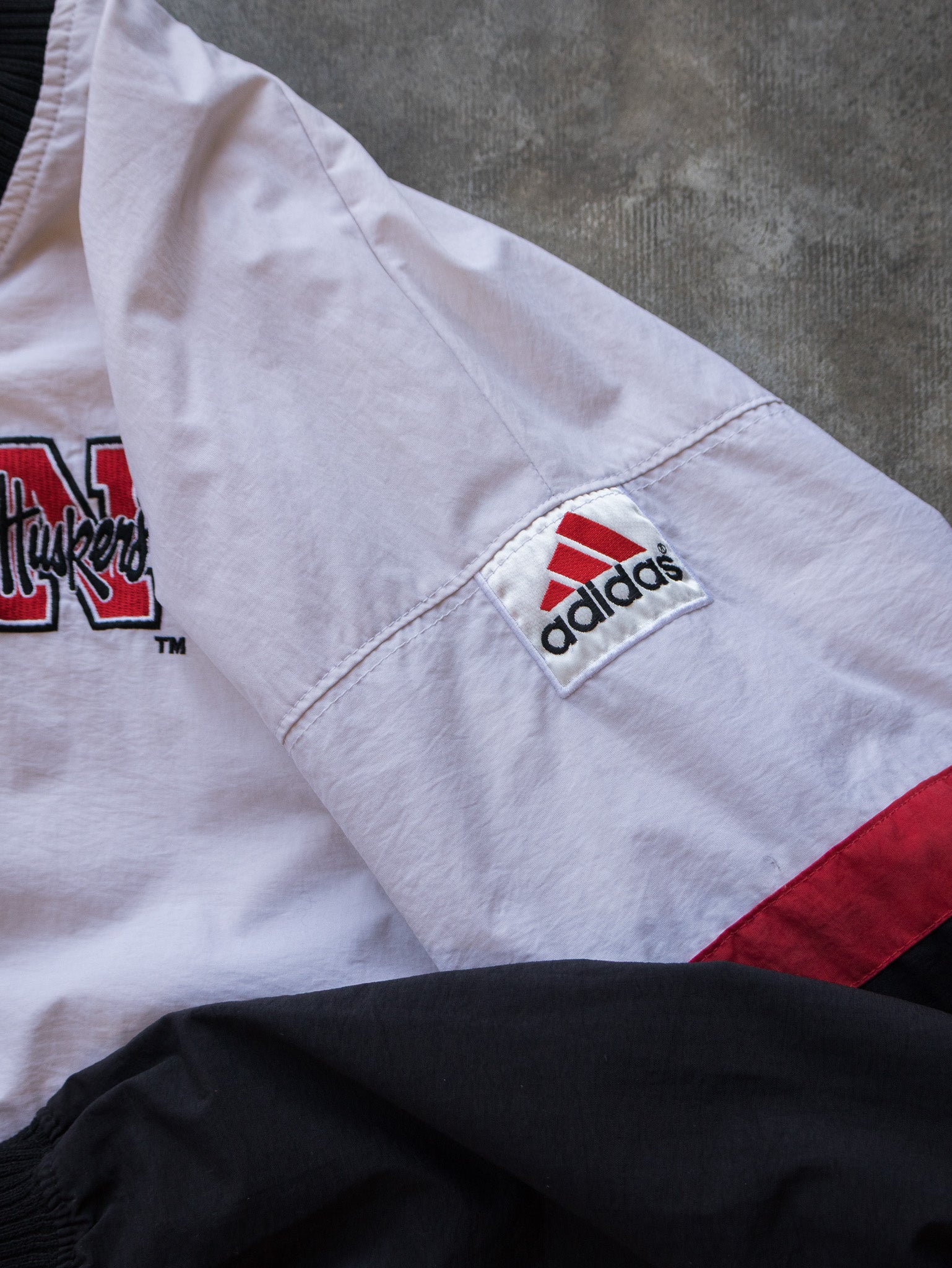 Vintage 90s White & Black Nebraska Huskers Adidas V-Neck Pullover Jacket (XL)