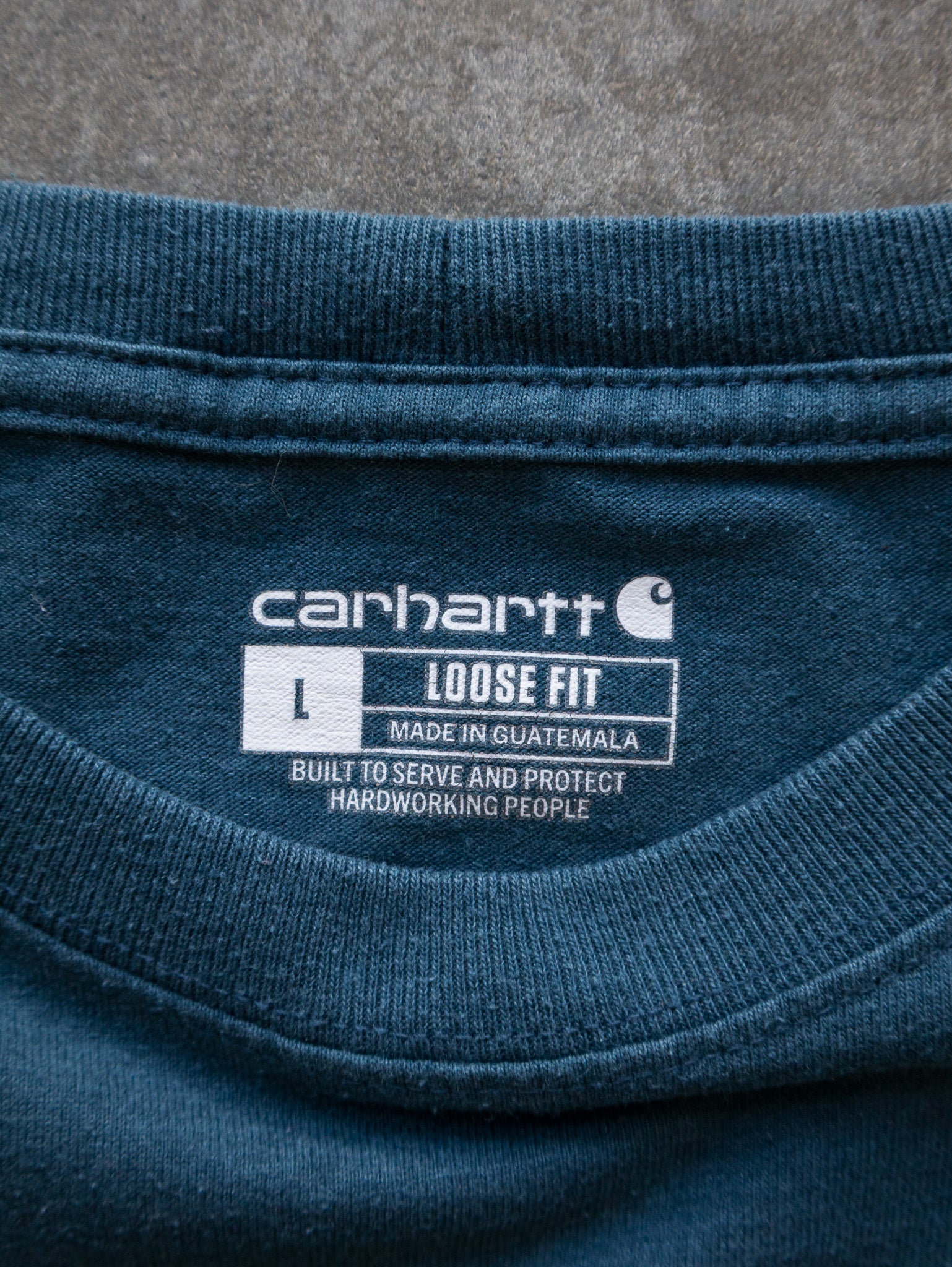 Vintage Blue Carhartt Spell Out Tee (L)