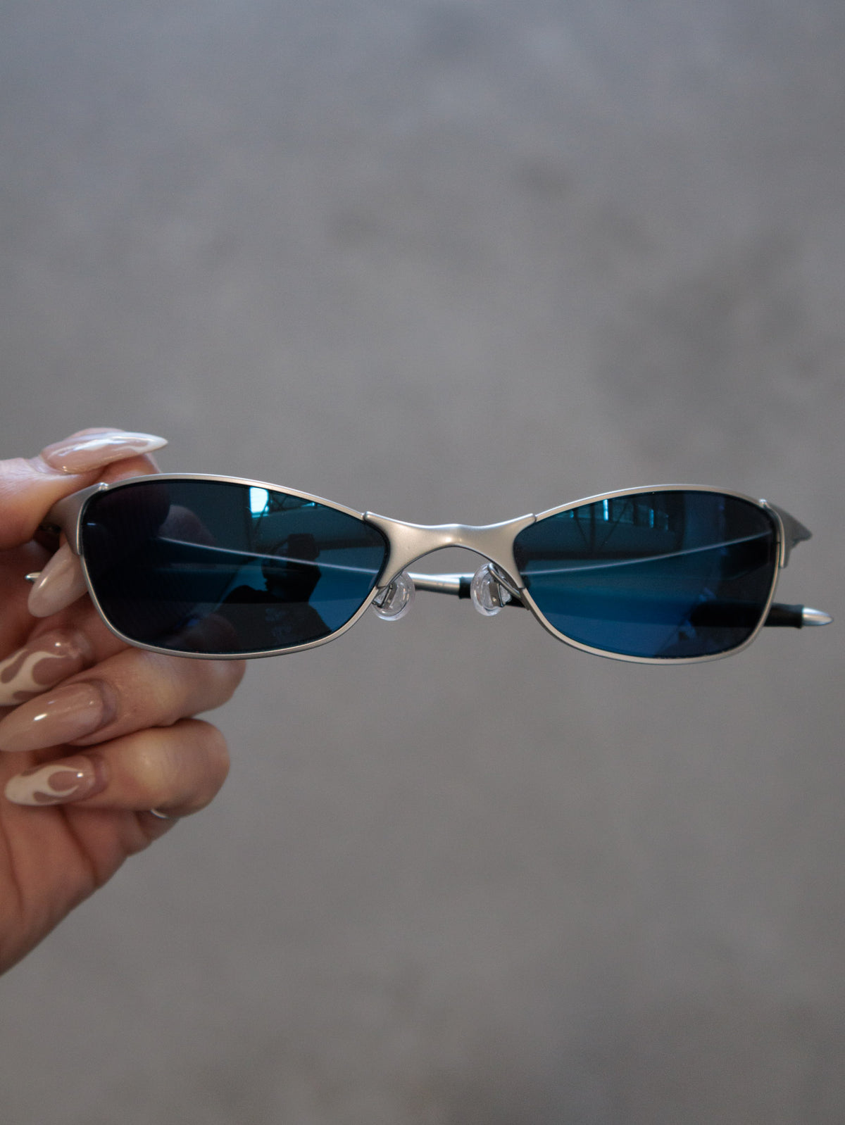 Vintage 00s silver Oakley Wiretap 1.0 sunglasses with blue mirror lenses