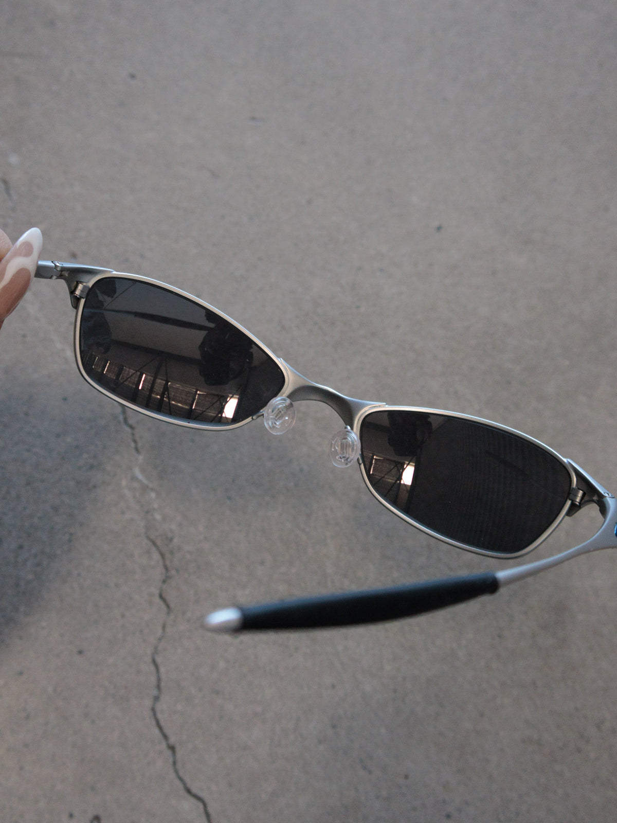 Vintage 00s silver Oakley Wiretap 1.0 sunglasses with blue mirror lenses