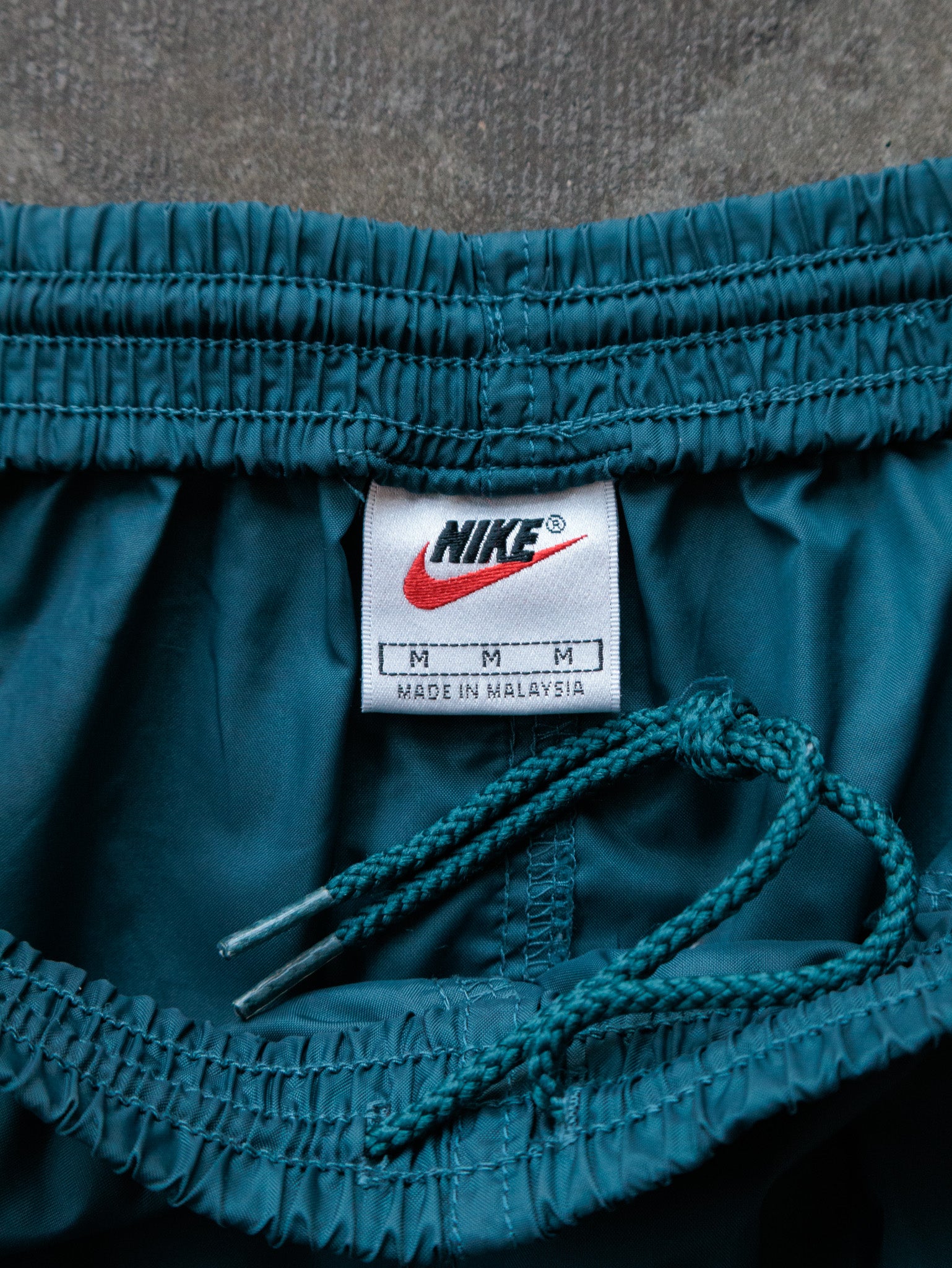 Vintage 90s Teal Nike Track Pants (M)