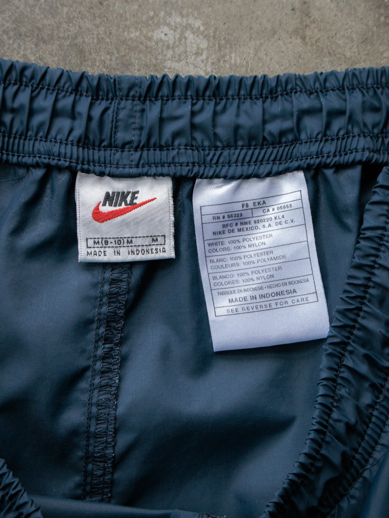 Vintage 00s Navy Nike Track Pants (Womens M)