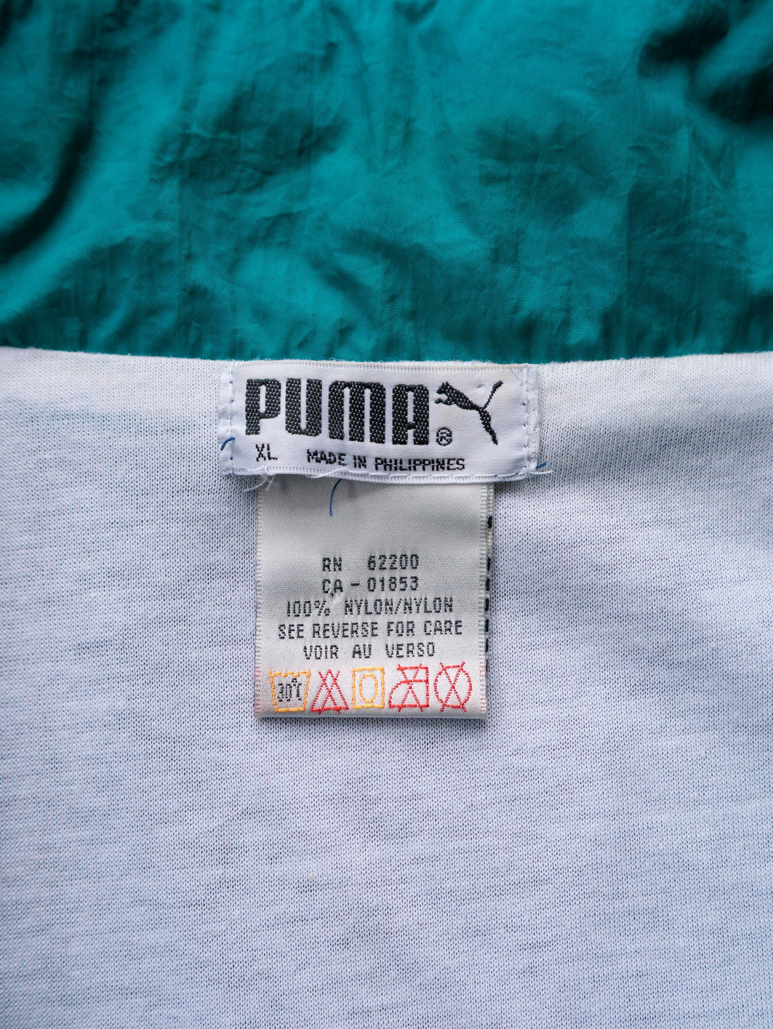 Vintage 90s Navy & Teal Puma Windbreaker (XL)