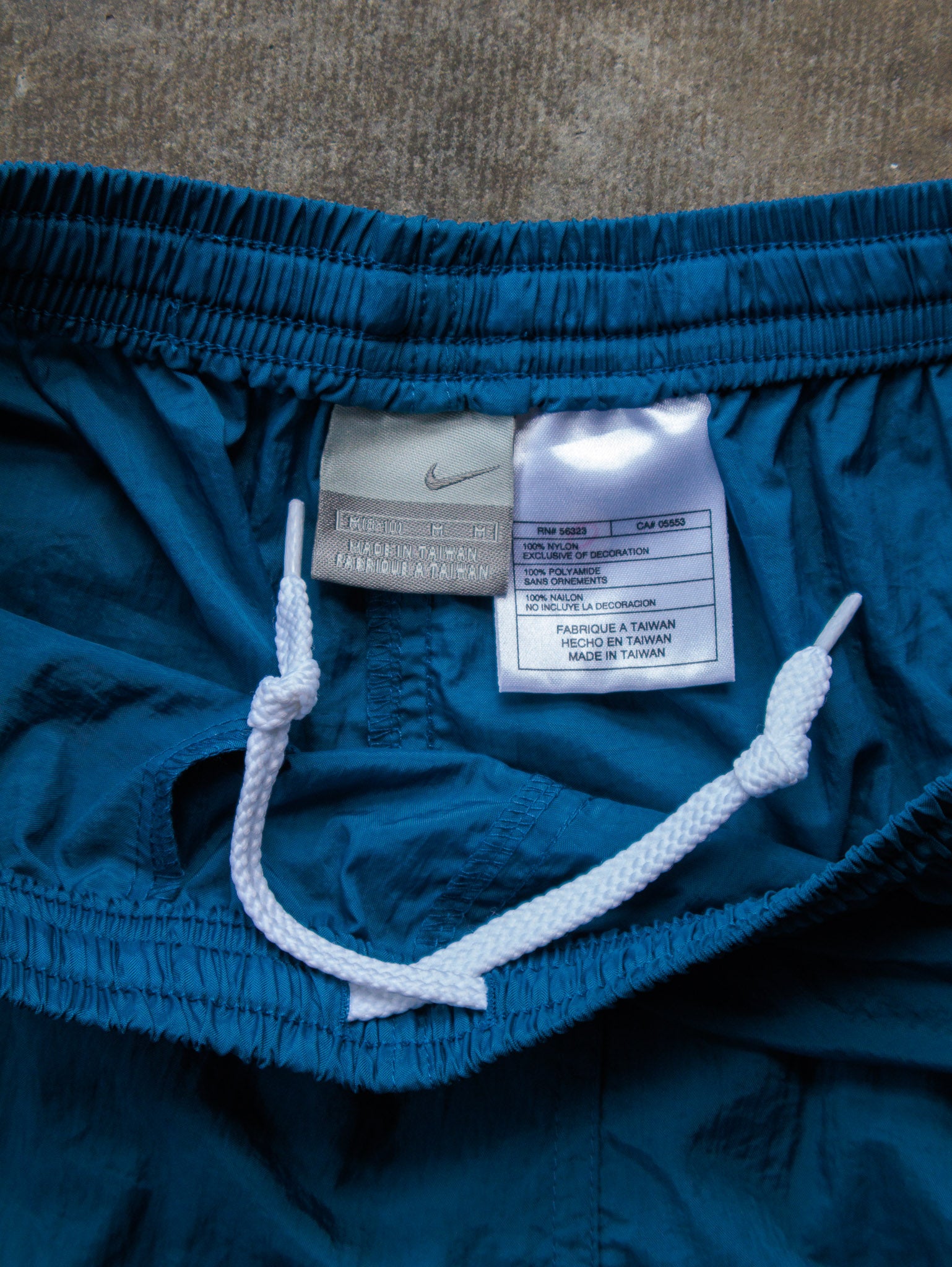 Vintage 00s Teal Nike Swim Shorts (8-10Y)