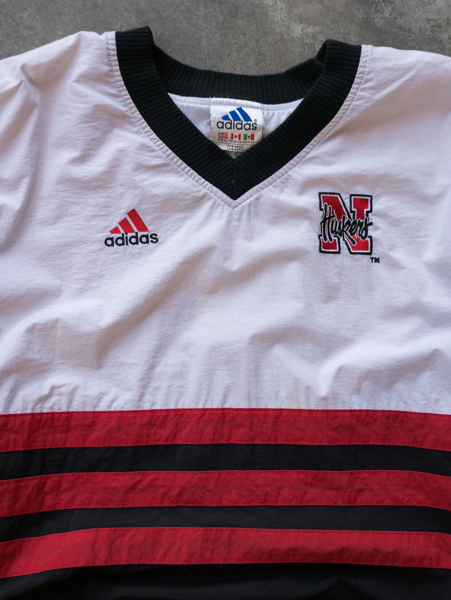 Vintage 90s White & Black Nebraska Huskers Adidas V-Neck Pullover Jacket (XL)