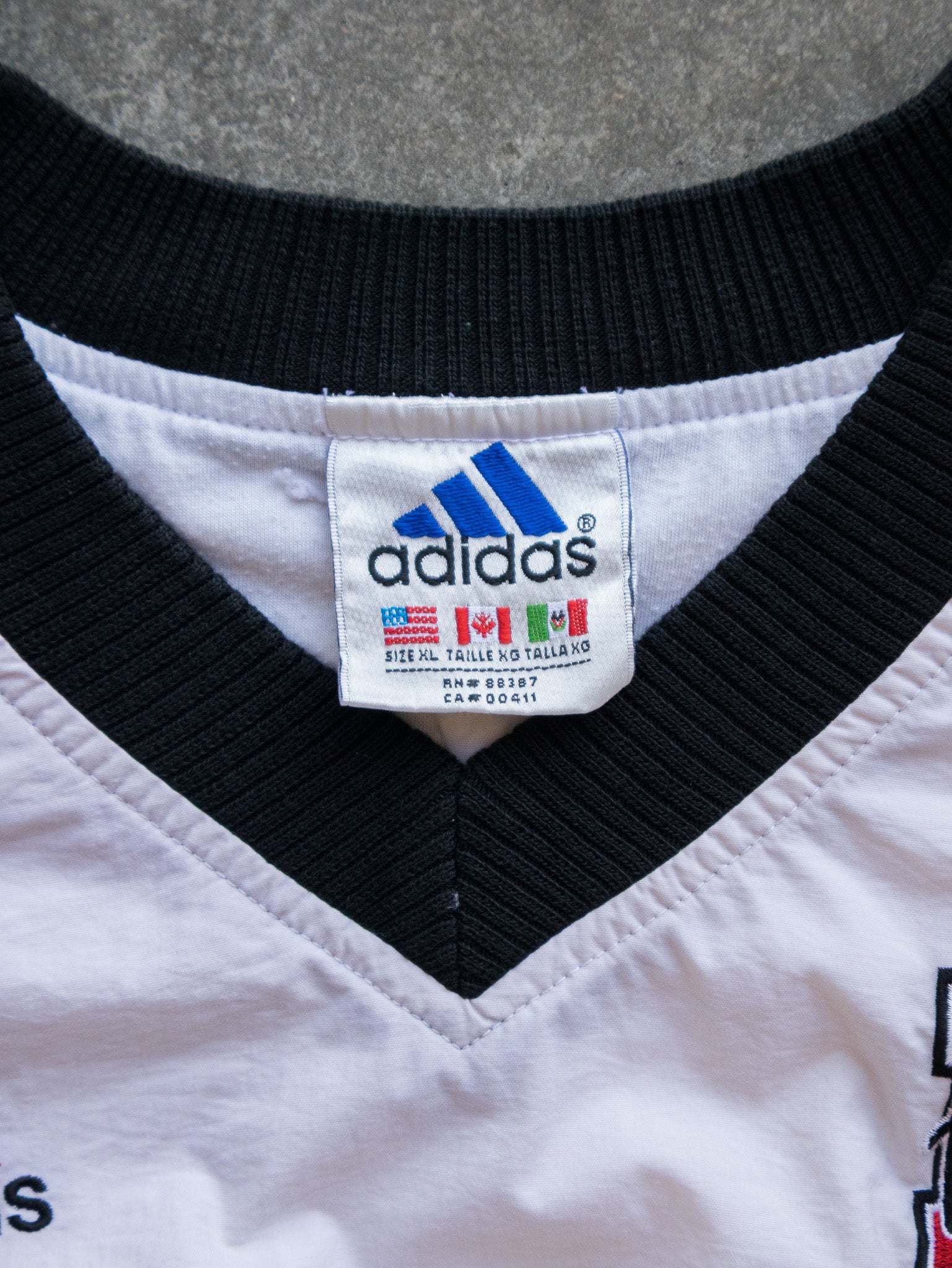 Vintage 90s White & Black Nebraska Huskers Adidas V-Neck Pullover Jacket (XL)