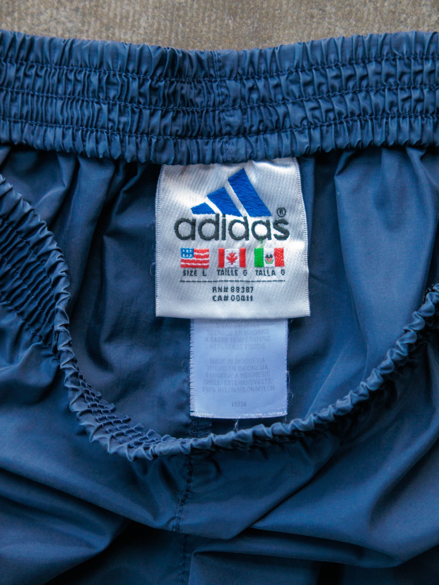 Vintage 90s Navy Adidas Track Pants (L)