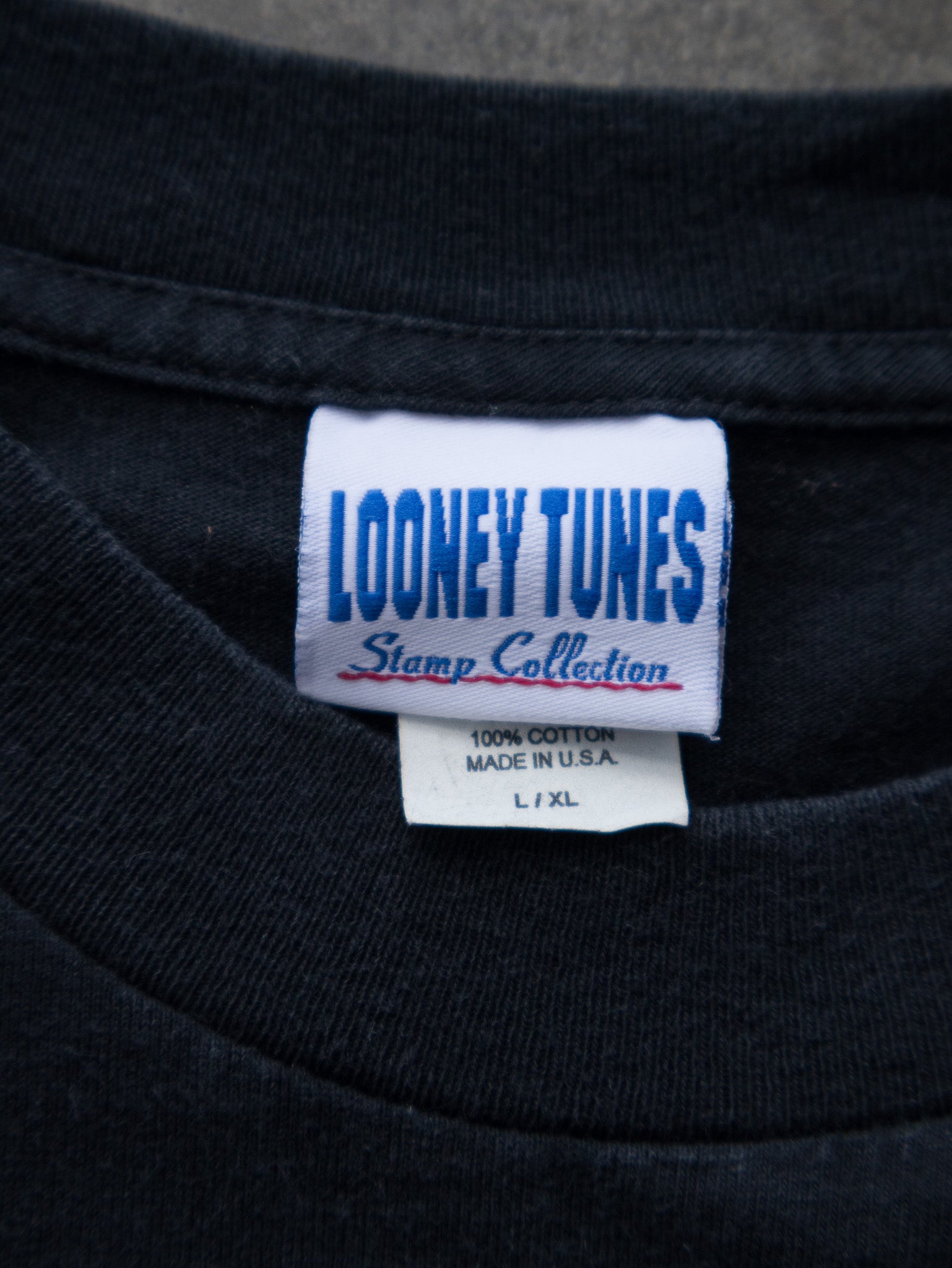 Vintage 90s Black Looney Tunes Tweety & Sylvester Stamp Collection Tee (XL)