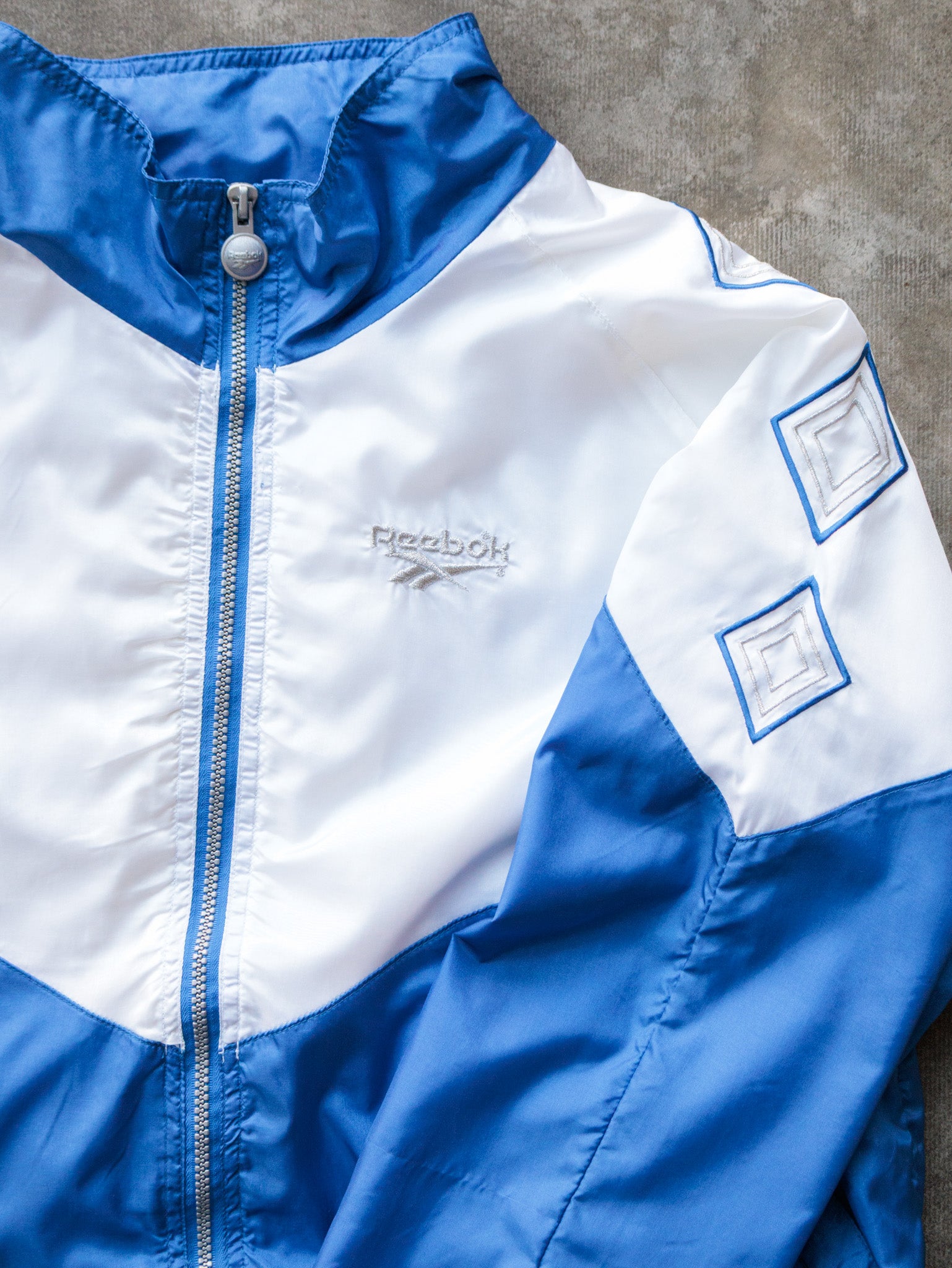 Vintage 90s Blue & White Reebok Track Jacket (XL)