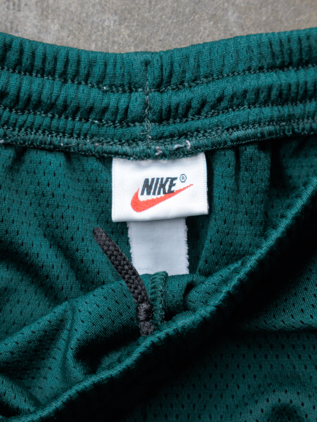 Vintage 90s Green Nike Mesh Shorts (-)