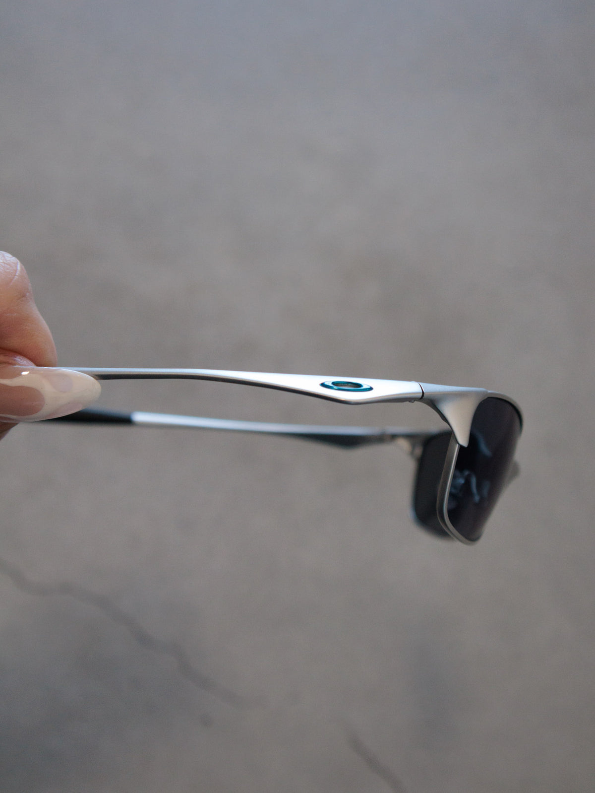 Vintage 00s silver Oakley Wiretap 1.0 sunglasses with blue mirror lenses