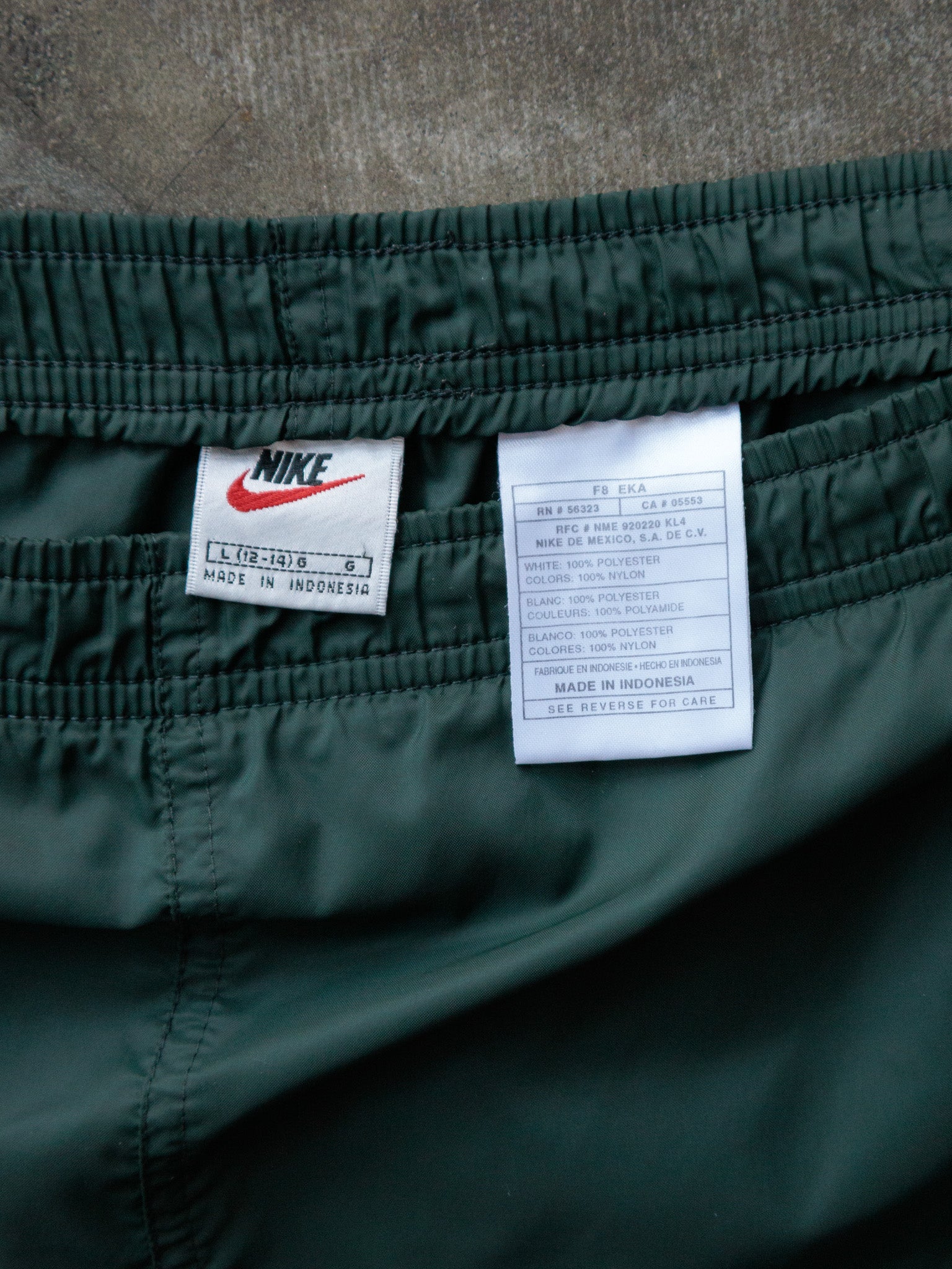 Vintage 90s Green Nike Track Pants (12-14Y)